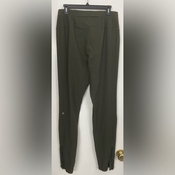 Lululemon Surge Olive Green Jogger Pants TALL Size Medium - Picture 4 of 7